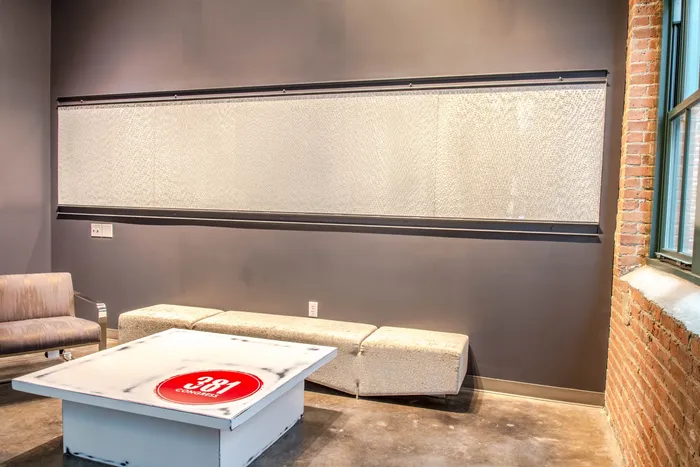 Gather with friends or simply unwind in a beautifully appointed common area featuring modern and sleek furnishings. | 381 Congress Lofts | Apartments For Rent in Boston