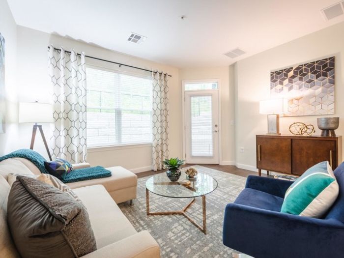 Living room with large windows | Apartments For Rent Chelmsford MA | Mill and 3 Apartments