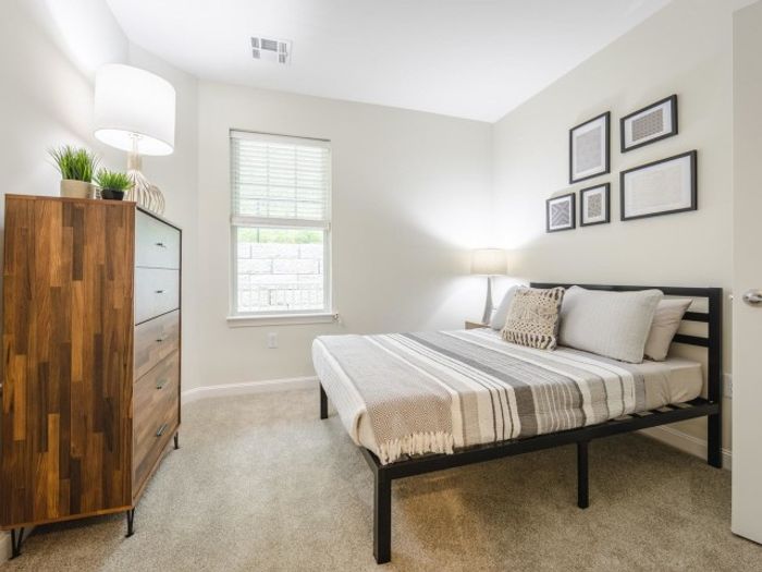 Carpeted bedroom | Apartments For Rent In Chelmsford MA | Mill and 3 Apartments