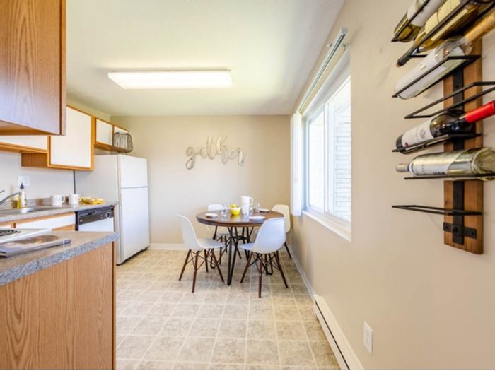 Cook your favorite meals with ease in the spacious, well-designed kitchen at our pet-friendly apartments in Dracut, MA. | Princeton Reserve | Dracut MA Apartments