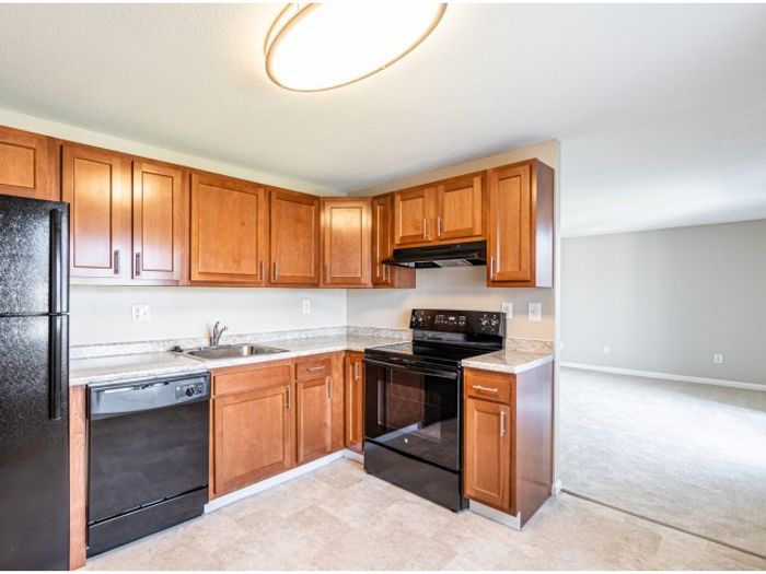 This inviting kitchen creates a warm gathering space where cooking and conversation flow naturally together.  | Princeton Reserve |