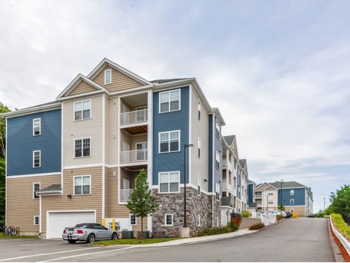 Mill and 3 Apartments exterior and driveway | Apartments For Rent In Chelmsford MA