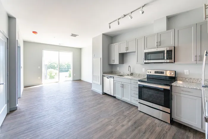 This spacious living room offers plenty of room for relaxation and entertaining with flexible layout options.  | The Chandler |