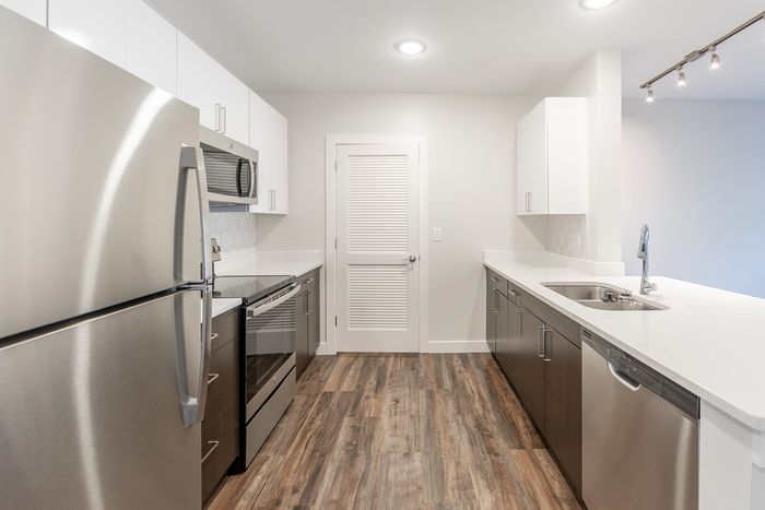 This renovated kitchen combines new finishes with improved layout for enhanced cooking and entertaining experience. | Princeton Dover Apartments |