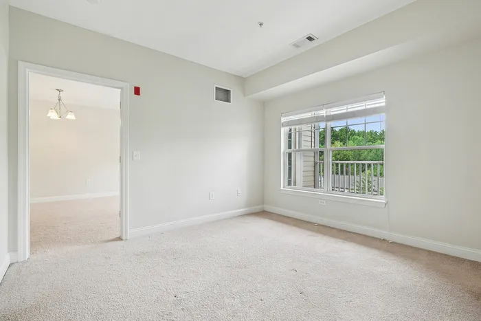 Your comfortable bedroom offers welcoming space with room for furniture, storage, and personal touches.  | Princeton Westford | Princeton Westford Apartments