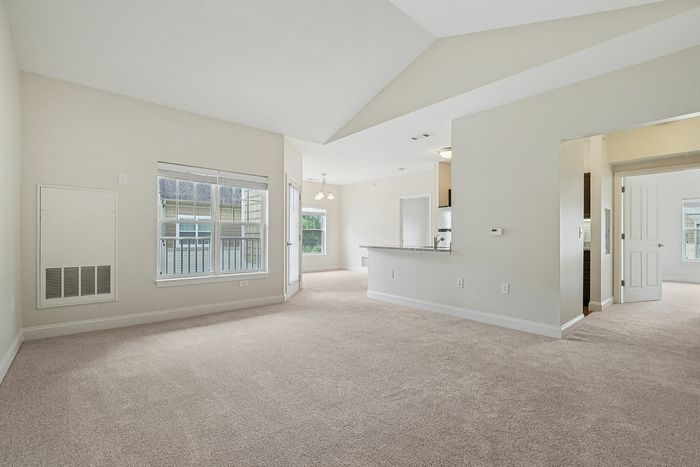 The well-proportioned living room offers versatile space for relaxation, entertainment, and personal expression. | Princeton Westford | Apartment in, Westford MA