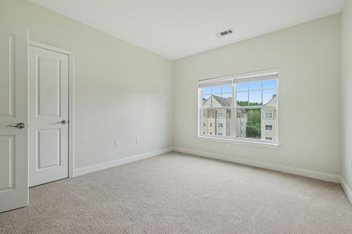 Your spacious bedroom provides comfortable proportions with space for all your furniture and personal belongings. | Princeton Westford |