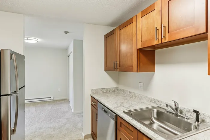 The gourmet-inspired kitchen features premium finishes and functional design elements for serious cooking enthusiasts.  | Princeton Place Apartments |