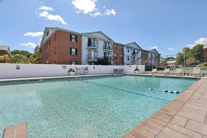 Our pool's water feature adds visual appeal and soothing sounds while enhancing your swimming and relaxation experience.  | Princeton Place Apartments | Princeton Place Apartments