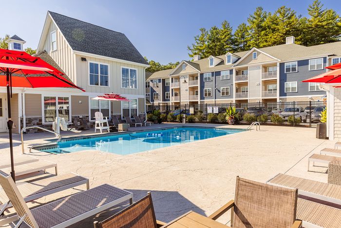 Your overlooking pool offers relaxing water views with recreational activities and community atmosphere. | Mill & 3 Apartments | Chelmsford Apartments