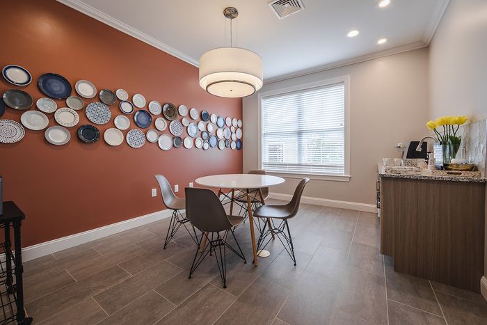 The comfortable dining area offers relaxed space for daily meals and casual entertaining with family and friends. | Mill & 3 Apartments | Apartment in Chelmsford, MA