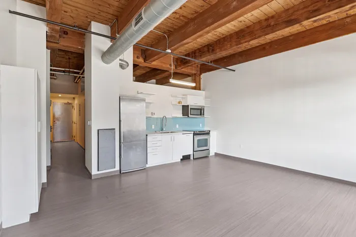 The updated kitchen features fresh finishes, quality appliances, and improved functionality for daily cooking needs. | 381 Congress Lofts | 381 Congress Lofts Apartments