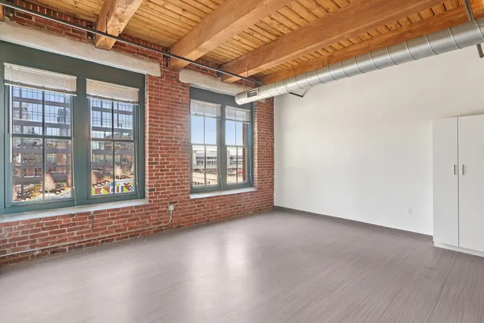 Your open hallway maximizes space and natural light while providing clear pathways between living areas. | 381 Congress Lofts |