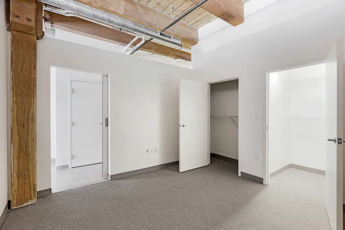 Your comfortable bedroom offers welcoming space with room for furniture, storage, and personal touches. | 381 Congress Lofts | 381 Congress Lofts Apartments