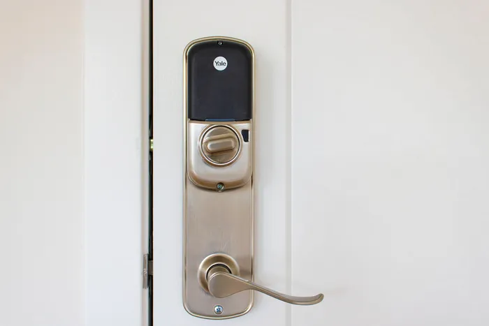 Elegant stainless steel smart door lock offering enhanced security and modern convenience for your home.