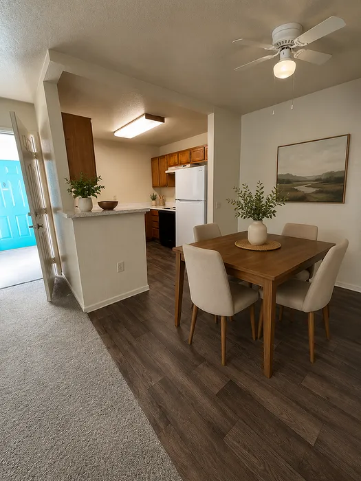 Charming apartment interior showcasing an inviting dining area with elegant wooden furniture, leading into a modern kitchen with rustic cabinetry.
