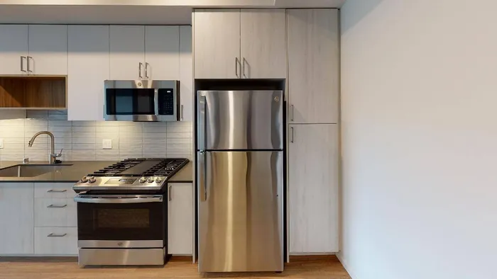 Closeup of kitchen storage and finishes in apartment at Modera River Train in Redmond, WA.
