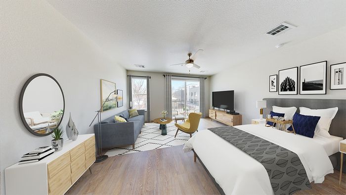 Studio home with wood plank-style flooring throughout