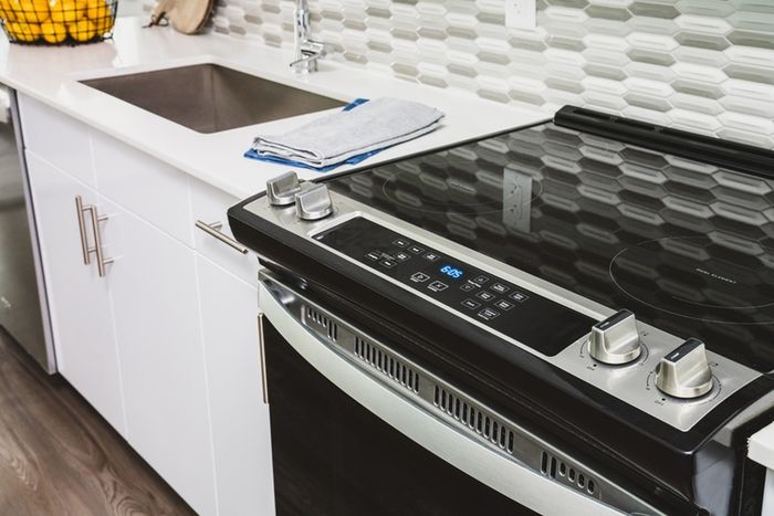 Close-up of Range and Sink in Prep-friendly Kitchen | Modera Creative Village | Apartments in Orlando
