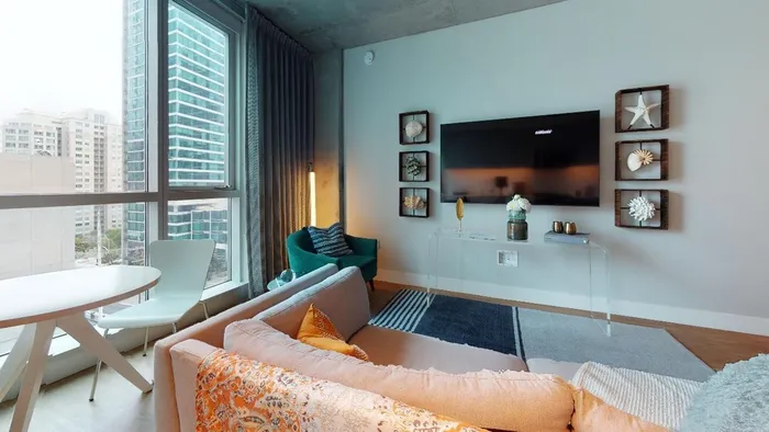 living room with tv  at Modera Rincon Hill apartments.