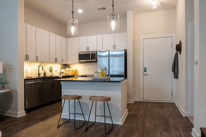 Prep friendly kitchen with stainless steel appliances  at Alister Uptown Charlotte
