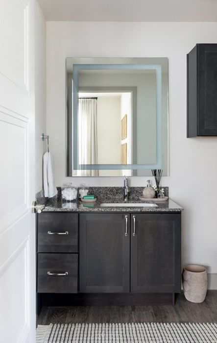 Upgraded fixtures in bathroom in a Modera Six Pines apartment.