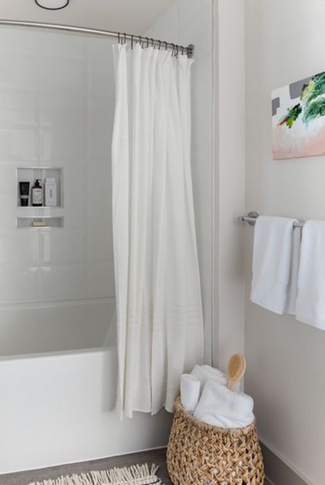 Spa-like bathrooms with upgraded fixtures in a home at Modera Six Pines apartments.