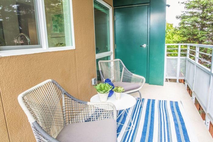 private balcony with green space views at the Arroyo Residences in Walnut Creek