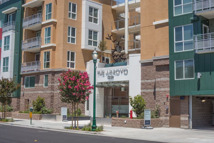 exterior and entrance of building with premium finishes at the arroyo residences in walnut creek