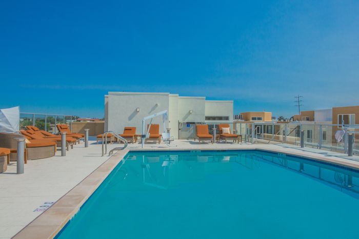 rooftop pool area with lounge seating  at the arroyo residences in walnut creek