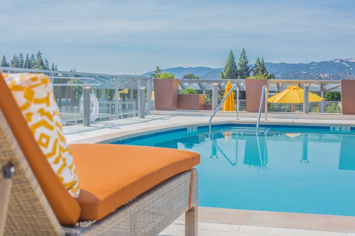 pool area with views and lounge seating at the arroyo residences in walnut creek
