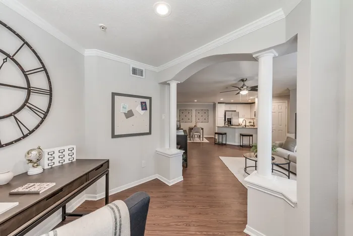 Office area leading into kitchen and living room at Alister Galleria apartments houston texas