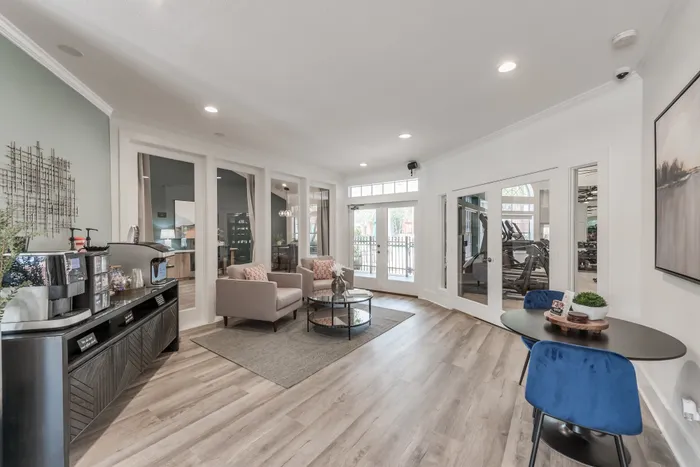 resident clubroom and seating area with coffee bar at Alister Galleria apartments in houston texas