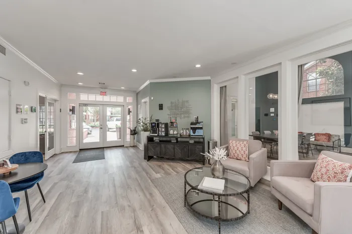 Entryway into resident clubroom with seating area at Alister Galleria apartments in houston texas