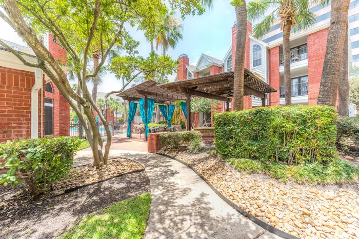 Outdoor covered seating area at Alister Galleria apartments in houston texas