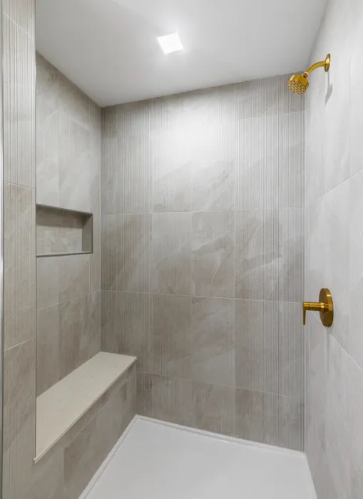 spa-like shower with modern fixtures modera cherry creek apartments denver