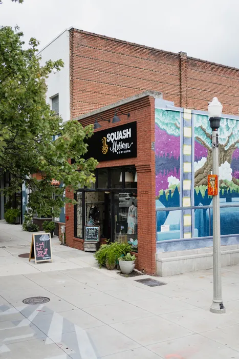 wall mural on exterior or retail space near modera decatur apartments georgia neighborhood retail