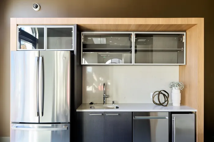 stainless steel appliances and prep kitchen at Modera Berkeley apartments California
