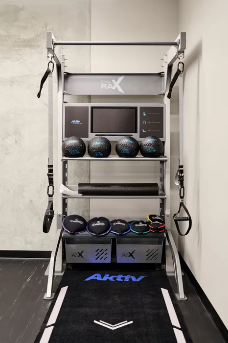 large fitness center with high-end equipment at Modera Berkeley apartments California