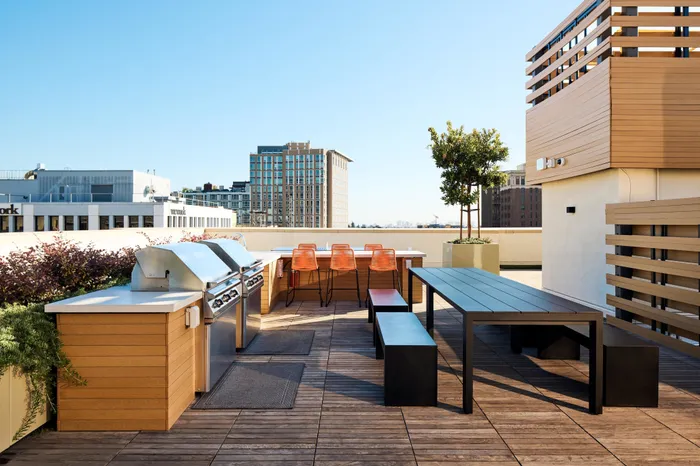 rooftop barbecue area at Modera Berkeley apartments California