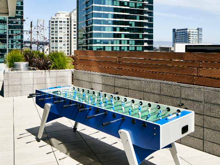 Get in the game with our rooftop foosball table at Modera Rincon Hill apartments.