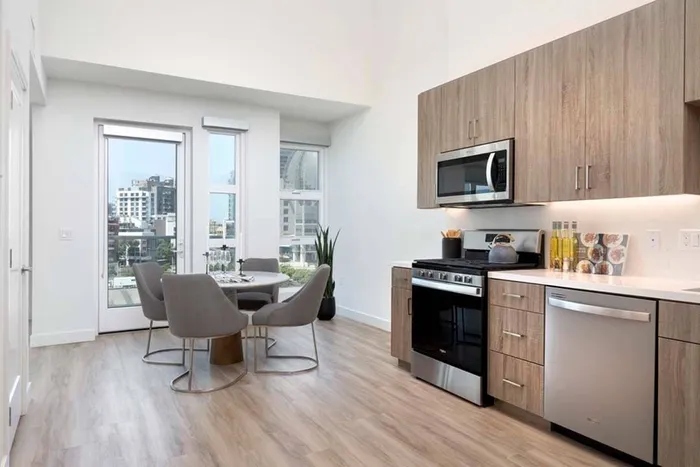 Loft layout with galley-style kitchen at Modera San Diego