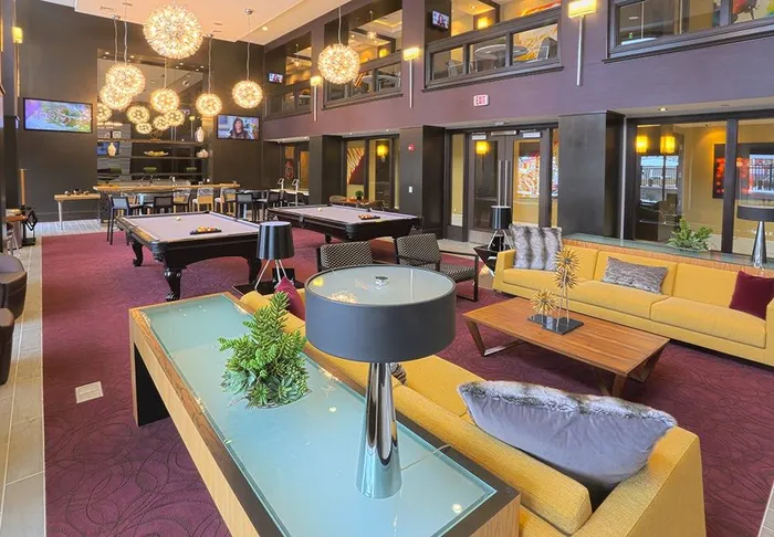 Resident lounge with billiards and ample seating