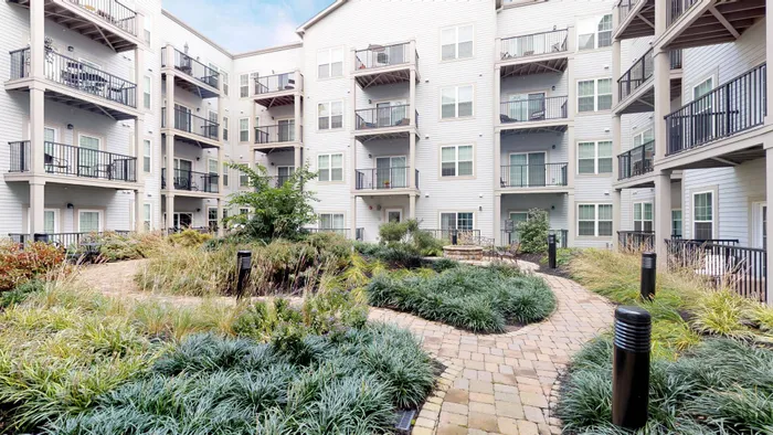 Lush courtyard surrounded by community
