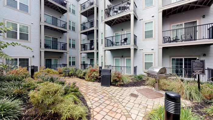 Courtyard with BBQ grill and social seating