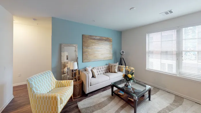 Living room with sustainable wood plank flooring
