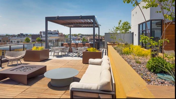 Rooftop dining space overlooking LoHi neighborhood
