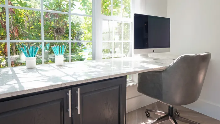 Convenient Business Center with Apple Computer and Over Sized Windows