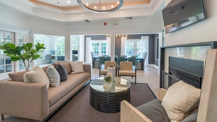Redesigned Clubroom with intimate seating and Mounted Flat Screen Television