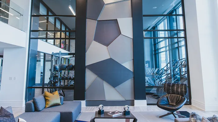 Amenity Deck with Floor to Ceiling Windows into Fitness Center